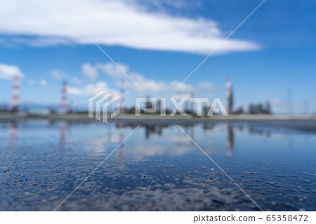Yokkaichi factory and puddle 65358472
