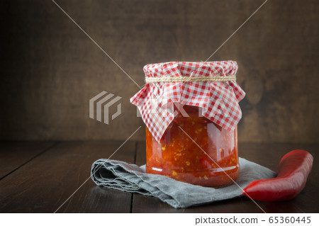 Traditional ajvar, adjika from red pepper, sauce, 65360445