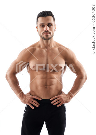 Shirtless muscular bodybuilder posing. 65364308