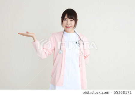 A lady in white A lady in white 65368171