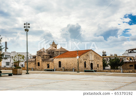 Agia Paraskevi old stone with domes and bell tower Agia Paraskevi old stone with domes and bell tower 65370192
