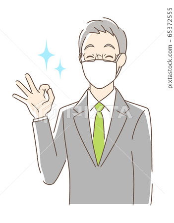 Smiling man wearing a mask Smiling man wearing a mask 65372555