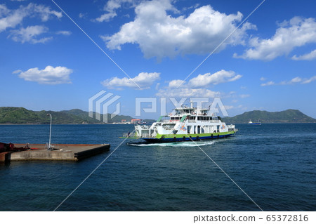 Ferry docked on the pier of Okunoshima 65372816