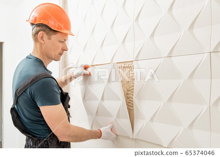 Installation of gypsum 3D panel. Installation of gypsum 3D panel. 65374046