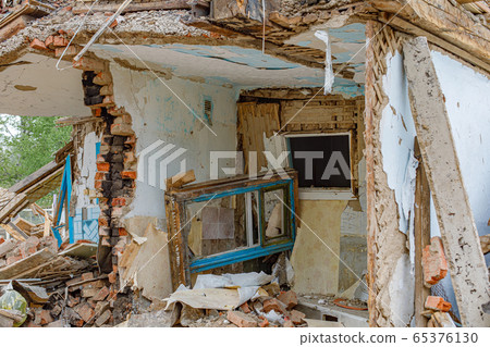 Rubble of old ruined house. Pile of construction 65376130