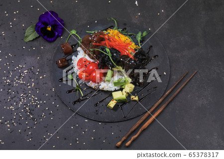 Poke bowl with raw salmon, rice, pineapple and vegetables Poke bowl with raw salmon, rice, pineapple and vegetables 65378317