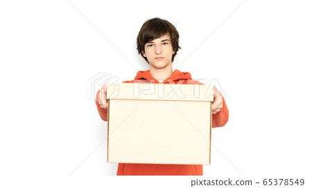 Food delivery. A man in holds a box. isolate copy Food delivery. A man in holds a box. isolate copy 65378549
