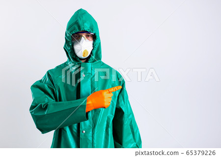 Disinfectant worker showing empty space on white background stock photo Disinfectant worker showing empty space on white background stock photo 65379226