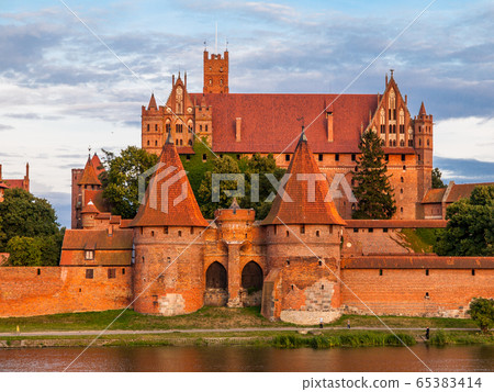 Fortification walls and guard towers of Teutonic Castle in Malbork, Poland Fortification walls and guard towers of Teutonic Castle in Malbork, Poland 65383414