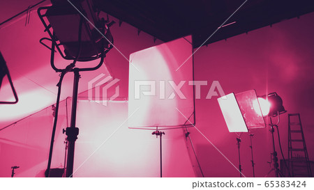 Flash light on tripod in studio production set up for professional photographer shooting photo or filming video and movie which use in entertainment and advertising industry Flash light on tripod in studio production set up for professional photographer shooting photo or filming video and movie which use in entertainment and advertising industry 65383424