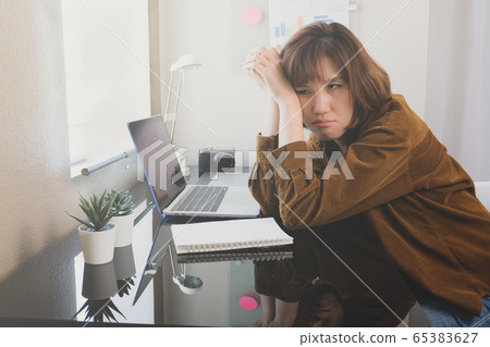 upset woman and unemployed from covid19 65383627