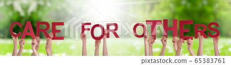 People Hands Holding Word Care For Others, Grass 65383761