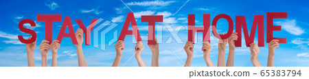 People Hands Holding Word Stay At Home, Blue Sky People Hands Holding Word Stay At Home, Blue Sky 65383794