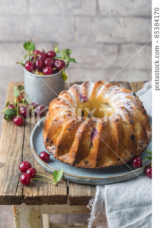 Fresh bundt cake with cherry Fresh bundt cake with cherry 65384170