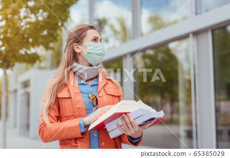 Student during covid-19 cannot enter closed university building Student during covid-19 cannot enter closed university building 65385029