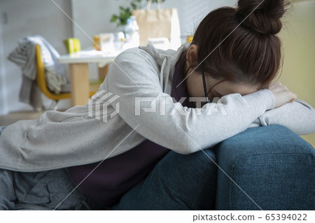 Depressed woman 65394022