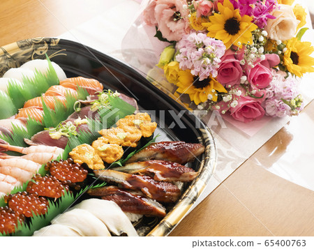 Fresh fish sushi platter and festive bouquet Fresh fish sushi platter and festive bouquet 65400763