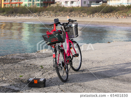 Red bicycle by the sea in the town of Pomorie Red bicycle by the sea in the town of Pomorie 65401830
