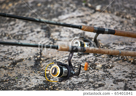 Image of fishing rod with modern reel 65401841