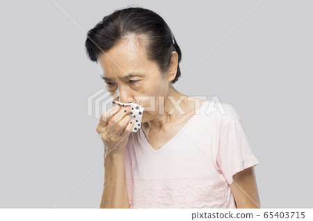 old asian woman feel have fever and sick 65403715