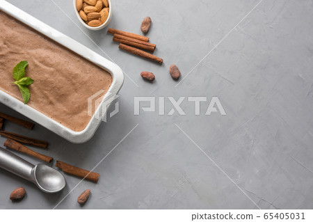 Banana chocolate homemade ice cream in container Banana chocolate homemade ice cream in container 65405031