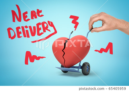Hand holding hand truck with red broken heart and 'Neat delivery' sign on blue background Hand holding hand truck with red broken heart and 'Neat delivery' sign on blue background 65405959