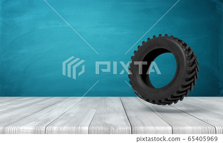 3d rendering of black tractor wheel on white wooden floor and dark turquoise background 3d rendering of black tractor wheel on white wooden floor and dark turquoise background 65405969