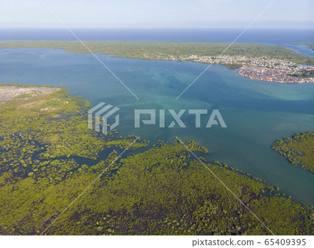 Uninhabited Tropical Islands in Indian Ocean. Aerial view of Pemba Island, Zanzibar. Tanzania. Africa 65409395
