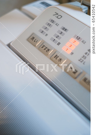 Washing machine in operation Washing machine in operation 65410542