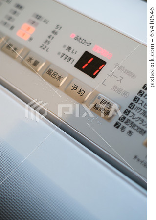 Washing machine in operation Washing machine in operation 65410546