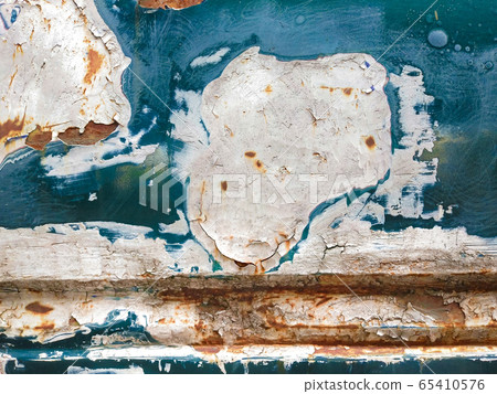 Close-up of old blue car paint cracks. 65410576