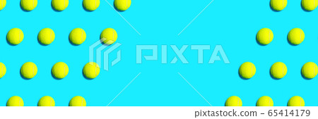 Trendy pattern made of tennis ball on blue green mint background.  65414179