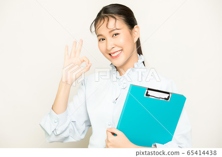 Cute and pretty female office worker person with business file material Cute and pretty female office worker person with business file material 65414438