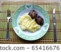 Mashed potatoes with meatballs. Home made food. 65416676