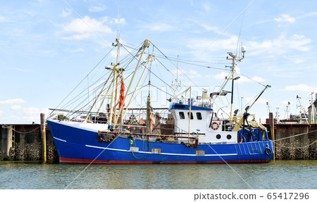 Fishing trawler in the port of Buesum in North Frisia (Germany) Fishing trawler in the port of Buesum in North Frisia (Germany) 65417296