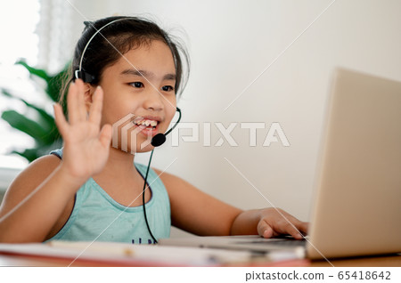 asian girl student wear headphone watch webinar asian girl student wear headphone watch webinar 65418642