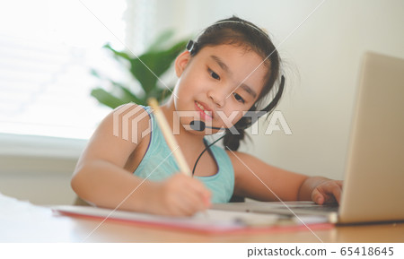 asian girl student wear headphone watch webinar asian girl student wear headphone watch webinar 65418645