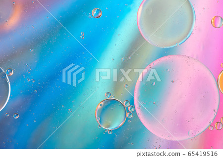 Defocused pastel colored abstract background picture made with oil, water and soap Defocused pastel colored abstract background picture made with oil, water and soap 65419516