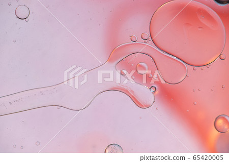 Pink abstract background picture made with oil, water and soap Pink abstract background picture made with oil, water and soap 65420005