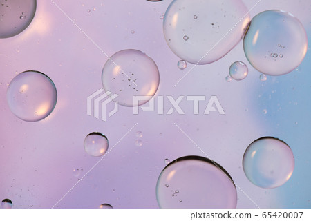 Defocused pastel colored abstract background picture made with oil, water and soap Defocused pastel colored abstract background picture made with oil, water and soap 65420007