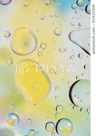 Green, yellow and white abstract background picture made with oil, water and soap Green, yellow and white abstract background picture made with oil, water and soap 65420566