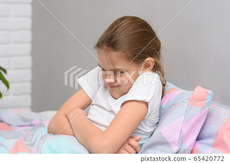 Teen girl ten years old does not want to go to bed Teen girl ten years old does not want to go to bed 65420772