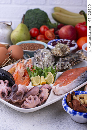 Pescetarian diet with seafood, fruit and vegetables Pescetarian diet with seafood, fruit and vegetables 65428490