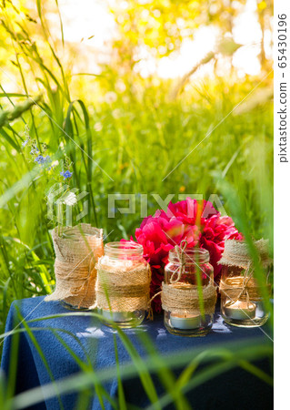 picnic table on the grass background. The table is picnic table on the grass background. The table is 65430196