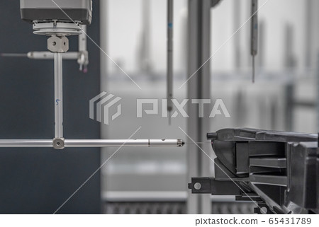 3D measuring device in a factory for the production of plastic castings for the automotive industry 65431789