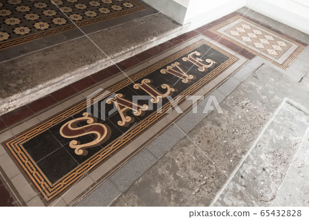 Mosaic flooring at the entrance with latin text Mosaic flooring at the entrance with latin text 65432828