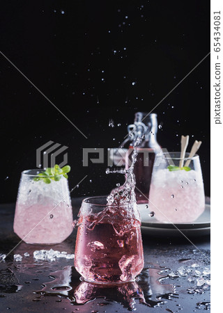 Splash of a pink cocktail Splash of a pink cocktail 65434081