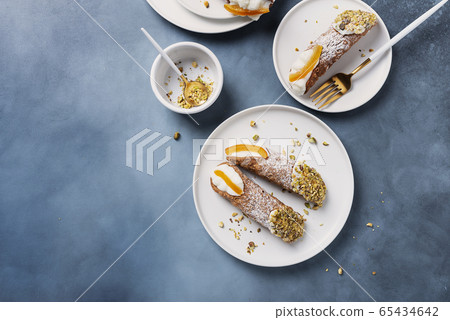 Traditional italian dessert cannoli siciliani Traditional italian dessert cannoli siciliani 65434642