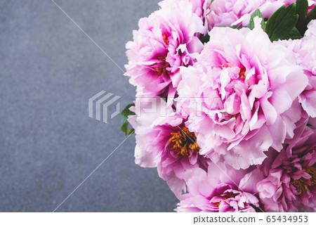 Heap of fresh beautiful purple pink peony flowers 65434953