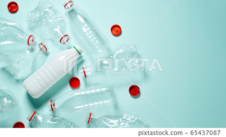 Many used plastic beverage bottles. 65437087